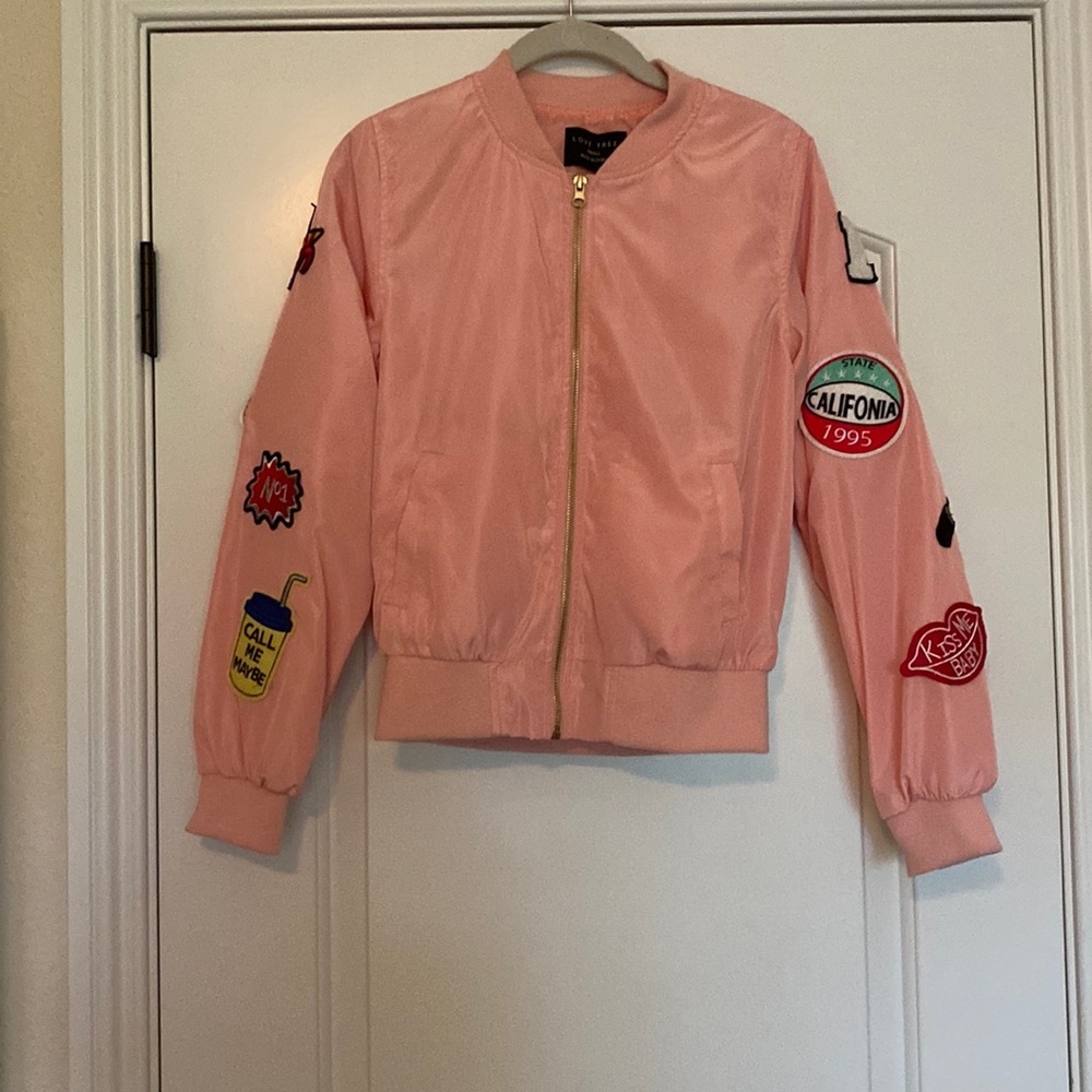 Pink jacket with patched on the sleeves (rain coat material)